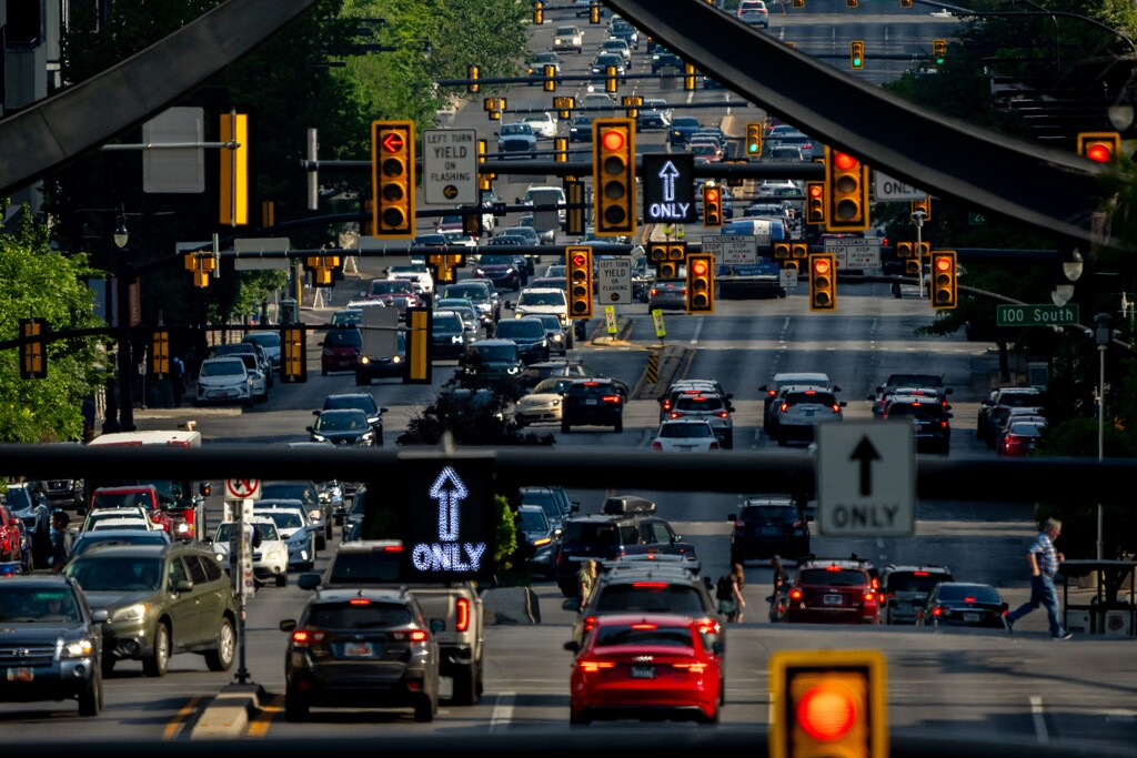 (Trent Nelson  |  The Salt Lake Tribune) State Street bustles with traffic in Salt Lake City on Monday, July 13, 2026.