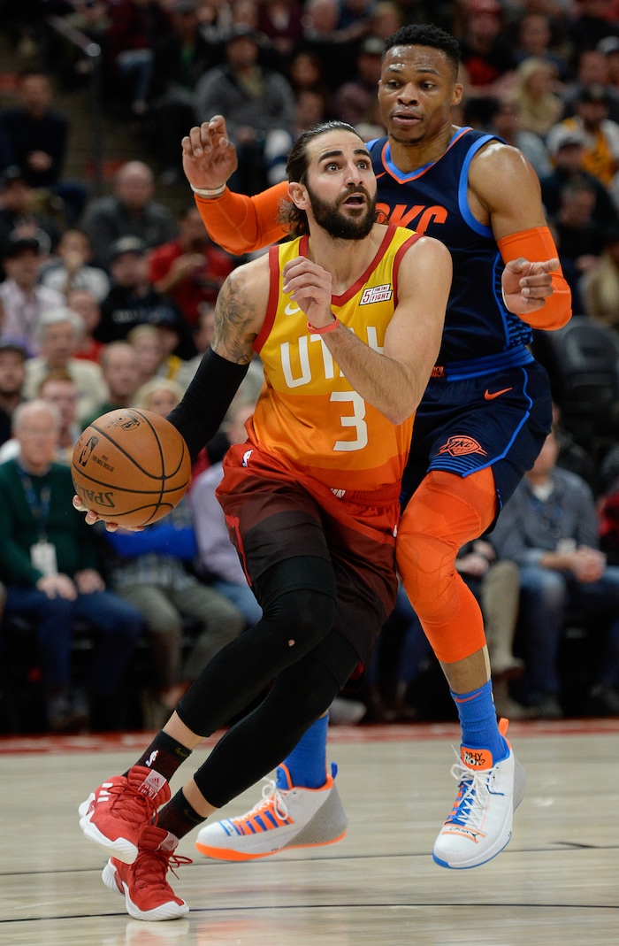 (Francisco Kjolseth  |  The Salt Lake Tribune)   Utah Jazz guard Ricky Rubio (3) pushes past Oklahoma City Thunder guard Russell Westbrook (0) in the NBA game at Vivint Smart Home Arena Sat., Dec. 22, 2018, in Salt Lake City.
