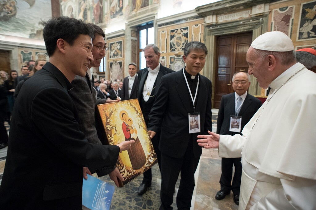 (L'Osservatore Romano/Pool Photo via AP) Pope Francis meets participants in the International symposium on a nuclear-weapons-free world, at the Vatican, Friday, Nov. 10, 2017. The Vatican hosted Nobel laureates, U.N. and NATO officials and a handful of nuclear powers at a conference aimed at galvanizing support for a global shift from the Cold War era policy of nuclear deterrence to one of total nuclear disarmament.
