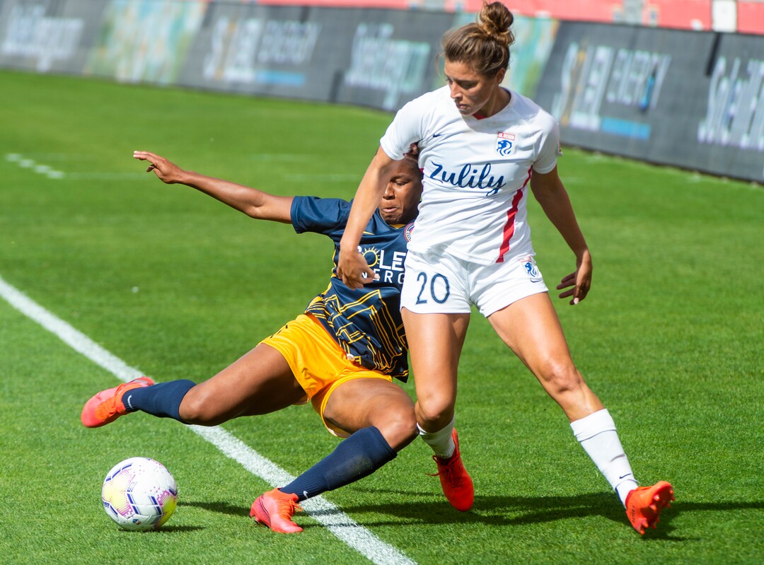 (Rick Egan  |  The Salt Lake Tribune) Utah Royals FC midfielder  Elizabeth Ball (7) goes for the ball along with OL Reign FC attacker SofiaHuerta, in soccer action between Utah Royals FC and Ol Reign FC at Rio Tinto Stadium in Sandy, Saturday, Sept. 26, 2020.