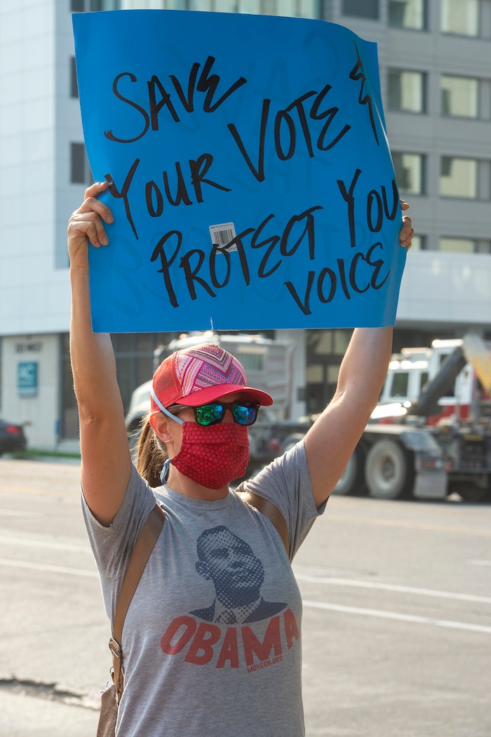 (Rick Egan  |  The Salt Lake Tribune)    Protesters gather for a rally to "Save the Post Office," hosted by Alliance for a Better Utah, NAACP Salt Lake Branch, League of Women Voters at the Post Office on 200 South in Salt Lake City, Saturday, Aug. 22, 2020.