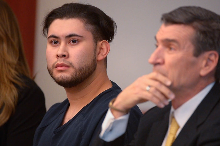 (Trent Nelson | The Salt Lake Tribune)  Abraham Miranda at his sentencing in Salt Lake City, Thursday December 21, 2017. Miranda, 19, pleaded guilty to manslaughter counts for a February crash that killed two of his West High School classmates and critically injured a pregnant woman and her baby. At right is Miranda's attorney Greg Skordas.