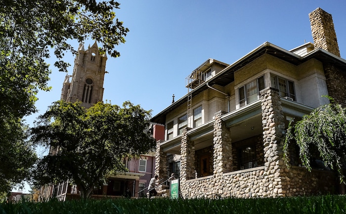 (Francisco Kjolseth  |  The Salt Lake Tribune)  Volunteers run the window at the Good Samaritan House at 347 E. South Temple, just down from Cathedral of the Madeleine where they hand out sack lunches on Tuesday, Aug. 27, 2019. After 32 years of serving sack lunches 365 days a year for 11 hours a day to Utah's poor, the Good Samaritan will be closing down, absorbed into the Catholic church's operations at St. Vincent's.