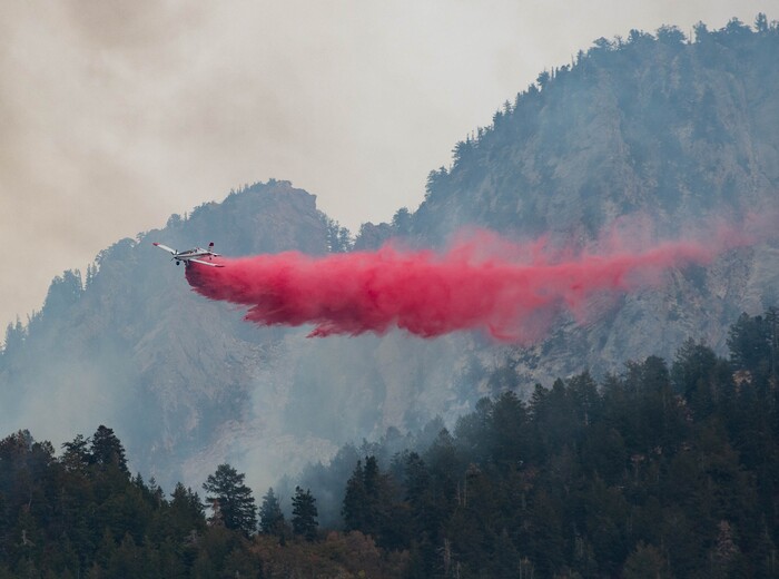 (Francisco Kjolseth  |  The Salt Lake Tribune) Air crews battle a fire in Neffs Canyon on the north side of Mount Olympus on Tuesday, Sept, 22, 2020.