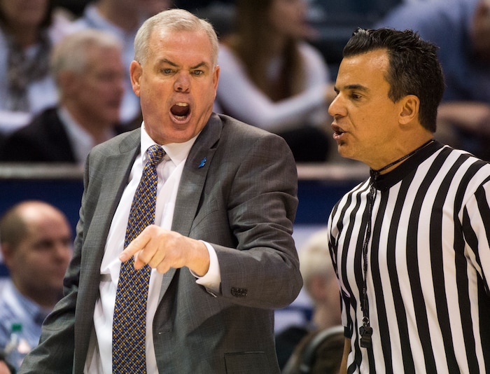 (Rick Egan  |  The Salt Lake Tribune)  Brigham Young Cougars head coach Dave Rose has a word with the referee, in basketball action at the Marriott Center, Saturday, February 10, 2018.