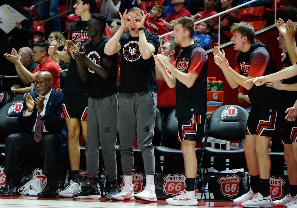 (Francisco Kjolseth | The Salt Lake Tribune) The Utah bench cheers on their team as the game goes into overtime as the University of Utah hosts Stanford in NCAA menÕs basketball, Thursday, Feb. 6, 2020, at the Jon M. Huntsman Center in Salt Lake City. The Utes went on to beat Stanford in overtime 64-56.