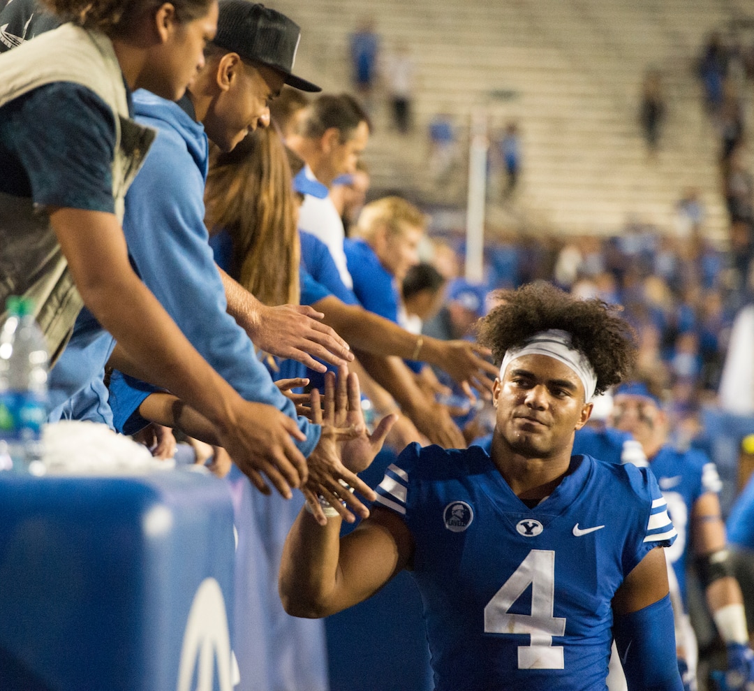 (Rick Egan  |  The Salt Lake Tribune)  Brigham Young linebacker Fred Warner (4) high-fives cougar fans, after BYU was defeated by the Utes 19-13, at Lavell Edwards Stadium in Provo, Saturday, September 9, 2017.