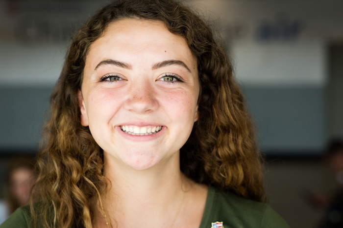 Courtesy | Michael McDonald. Mormon missionary Erin McDonald meets by chance with her parents at the Atlanta airport while evacuating from Puerto Rico on September 23, 2017.