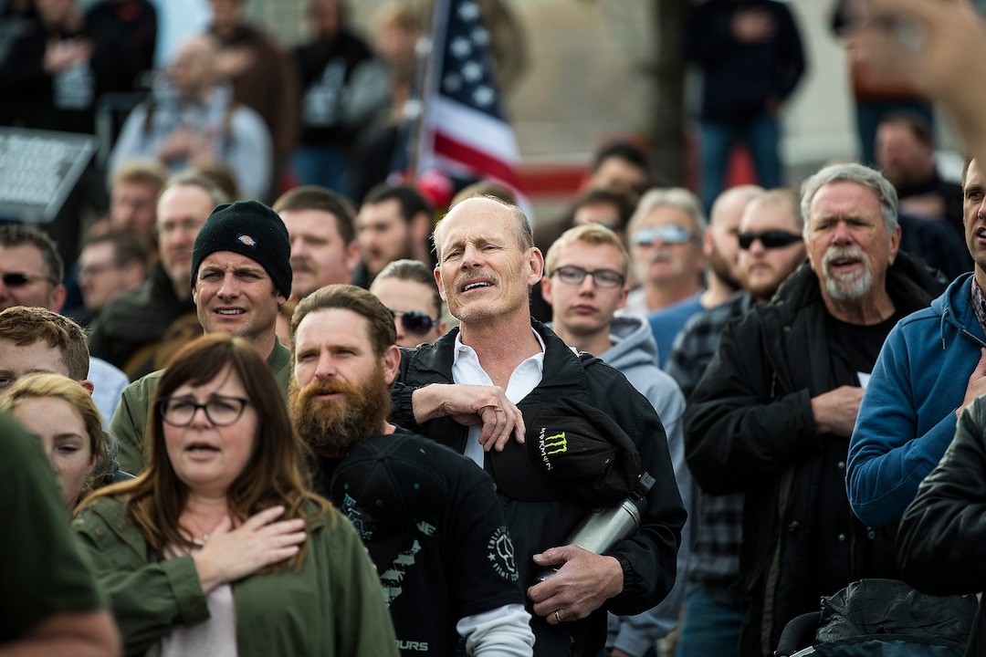 (Chris Detrick | The Salt Lake Tribune)  Participants hold signs during the March Before Our Lives rally near West High School in Salt Lake City Saturday, March 24, 2018.