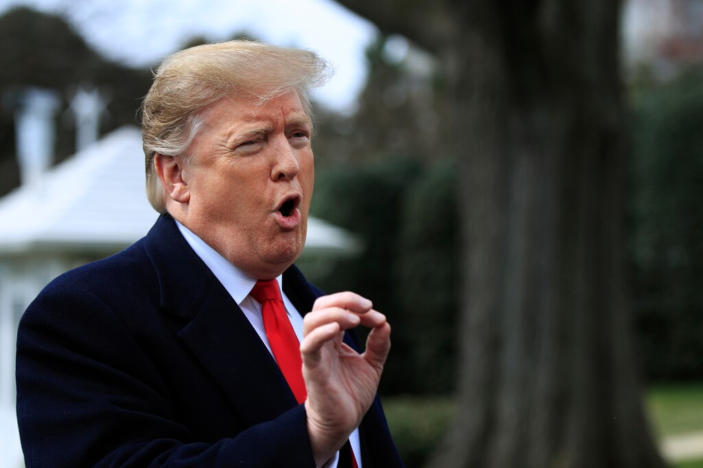 (Manuel Balce Ceneta | AP file photo)  Donald Trump speaks to reporters before leaving the White House in Washington, Wednesday, March 20, 2019, for a trip to visit a Army tank plant in Lima, Ohio, and a fundraising event in Canton, Ohio. Trump is escalating his increasingly awkward public fight with the spouse of a top aide. Trump is continuing to target Kellyanne Conway's husband on Twitter, calling him "a stone cold LOSER" and "husband from hell!" That's after George Conway, an attorney, repeatedly criticized Trump and questioned the president's mental health.
