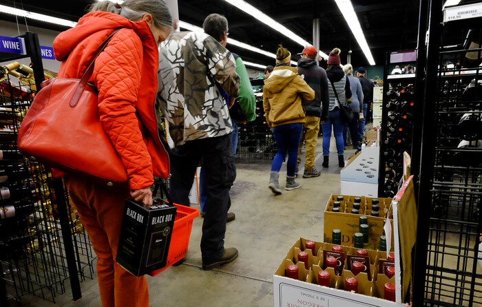(Francisco Kjolseth | The Salt Lake Tribune) The day before Thanksgiving is the busiest day of the year at Utah's state-run liquor stores, and the store in Cottonwood Heights at 1863 E. Fort Union Blvd., makes the most sales in the state, as long lines form inside the store.