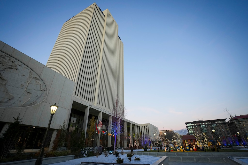 (Bethany Baker | The Salt Lake Tribune) Christmas lights are seen at the Church Office Building in November 2024. Plaintiffs are seeking to have their lawsuit over tithing reinstated against the church.