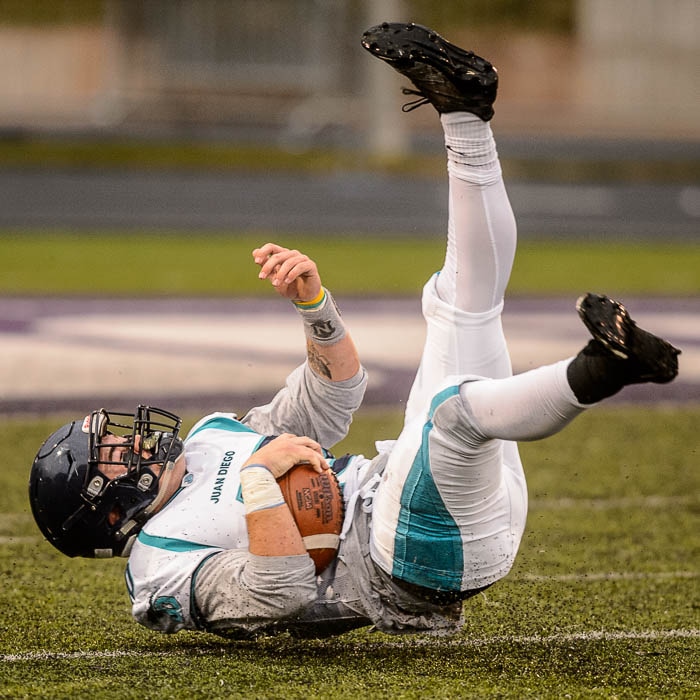 (Trent Nelson | The Salt Lake Tribune)  Juan Diego's Hunter Easterly lands after being tripped up on a long run. Summit Academy faces Juan Diego High School in a class 3A state semifinal football game at Weber State University's Stewart Stadium, Saturday November 4, 2017.