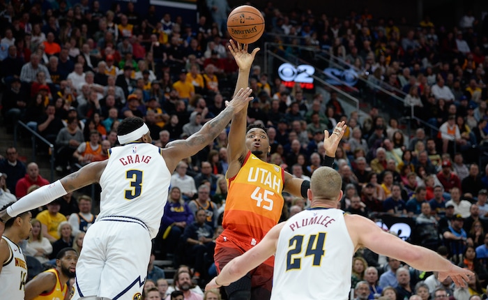 (Francisco Kjolseth  |  The Salt Lake Tribune)  Utah Jazz guard Donovan Mitchell (45) looks for an opening as the Utah Jazz host the Denver Nuggets in their NBA game at Vivint Smart Home Arena Tuesday, April 9, 2019, in Salt Lake City.