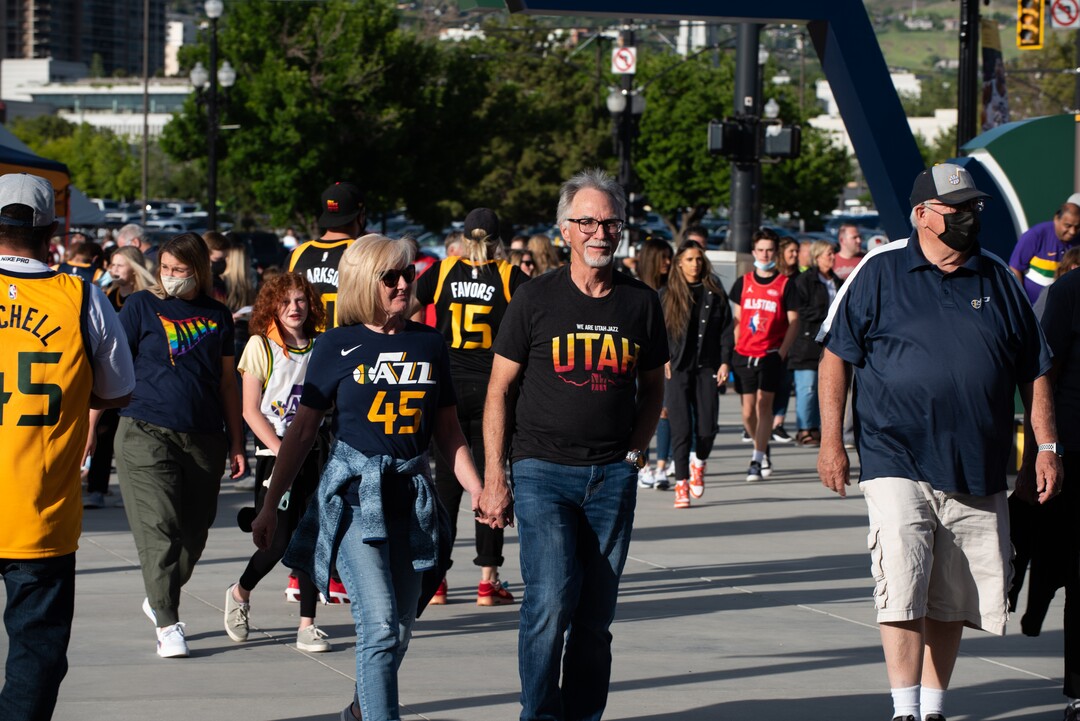 (Briana Scroggins | Special to The Tribune) Rob and Jan Boardman, of Bluffdale, hold hands as they walk towards the entrance of Vivint Smart Home Arena before the Jazz play the Memphis Grizzlies in Salt Lake City on Wednesday, May 26, 2021.