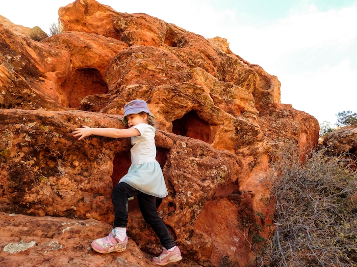 The Salt Lake Tribune|Erin Alberty
A hiker climbs on red rock formations on the trail to Babylon Arch on March 12, 2017 in the Red Cliffs Desert Reserve near Leeds.
