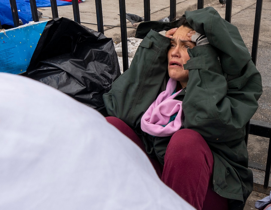 (Rick Egan | The Salt Lake Tribune) Ashley Gomez sits amongst her belongings after being forced to pack up her things on Rio Grande Street, on Monday, Jan. 9, 2023.