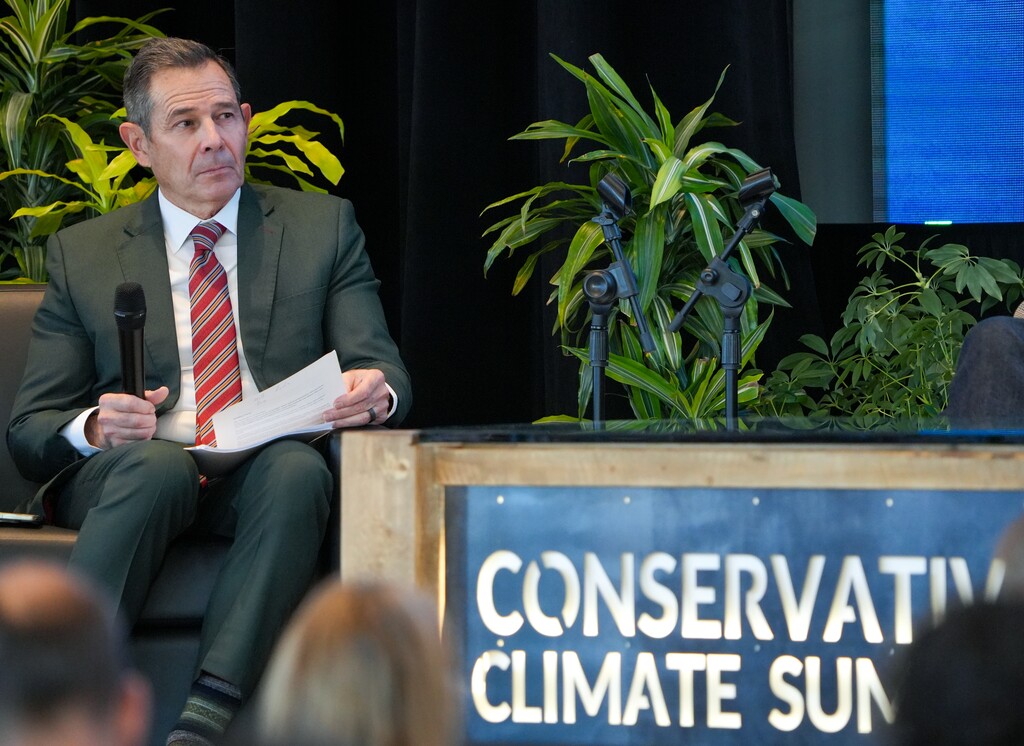 (Chris Samuels | The Salt Lake Tribune) U.S. Sen. John Curtis moderates a panel on forest fires at the Conservative Climate Summit at the University of Utah in Salt Lake City, Friday, Oct. 17, 2025.