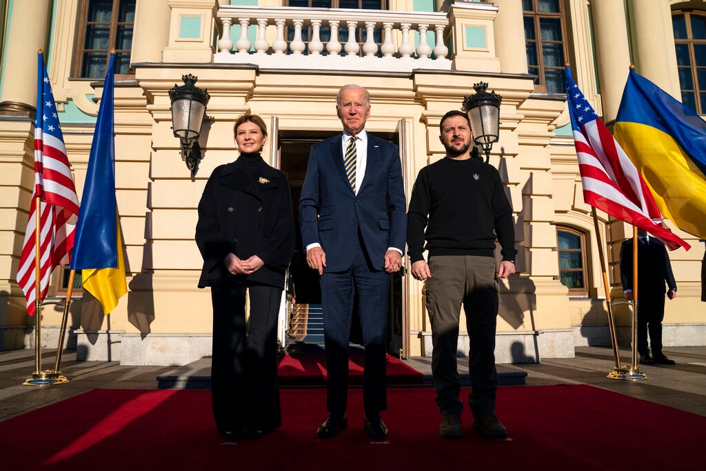 (Evan Vucci | AP) President Joe Biden, center, poses with Ukrainian President Volodymyr Zelenskyy, right, and Olena Zelenska, left, spouse of President Zelenskyy, at Mariinsky Palace during an unannounced visit in Kyiv, Ukraine, Monday, Feb. 20, 2023.