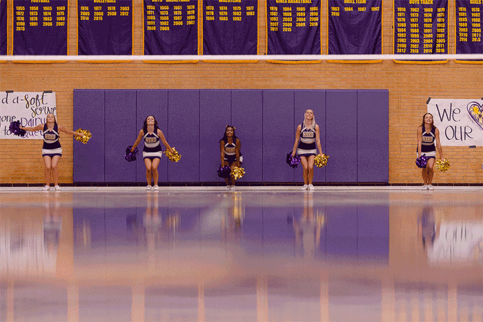 (Trent Nelson  |  The Salt Lake Tribune)  Cheerleaders leap as North Summit hosts Bingham, high school girls' volleyball in Coalville, Thursday August 17, 2017.