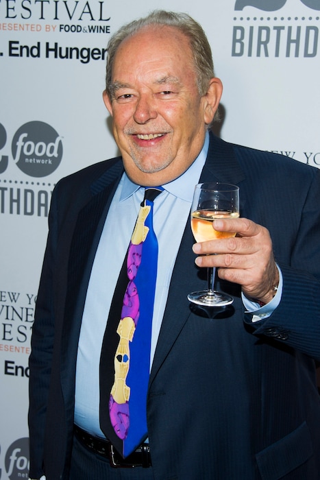 FILE - In this Oct. 17, 2013 file photo, Robin Leach attends the Food Network's 20th birthday party in New York.  Leach, whose voice crystalized the opulent 1980s on TV's "Lifestyles of the Rich and Famous," has died, Friday, Aug. 24, 2018.  (Photo by Charles Sykes/Invision/AP, File)