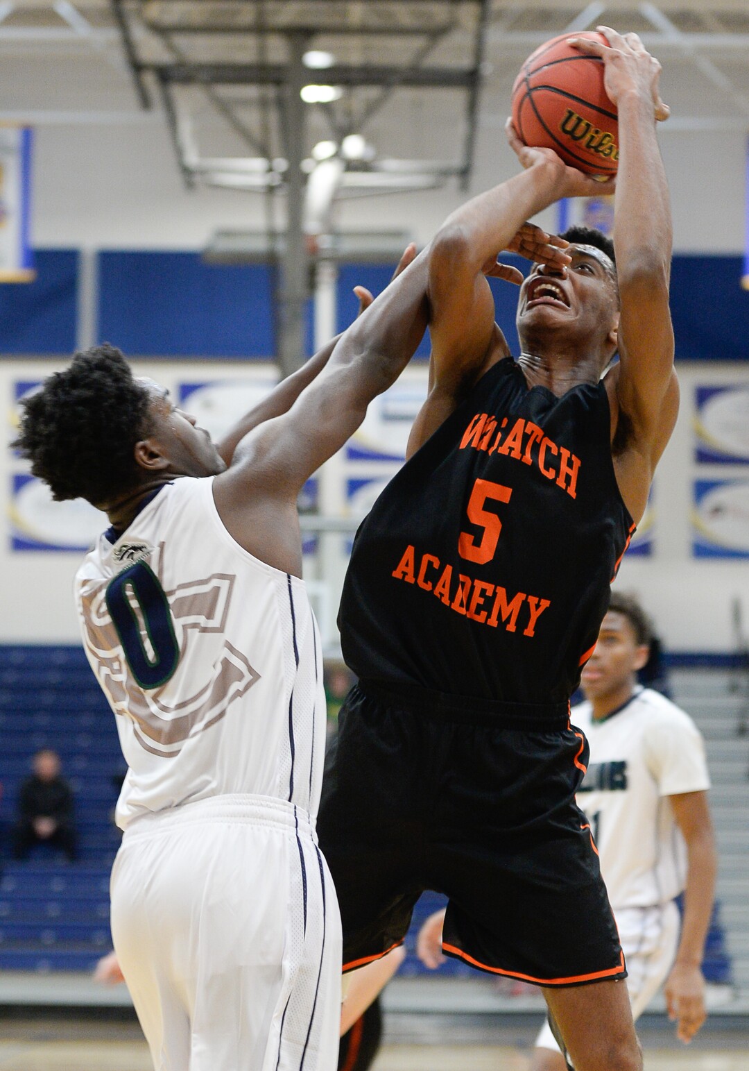 (Francisco Kjolseth  |  The Salt Lake Tribune)  Noah Bullock of South County High tries to block a shot by Bernardo Da Silva of Wasatch Academy during a recent tournament at Orem High. 