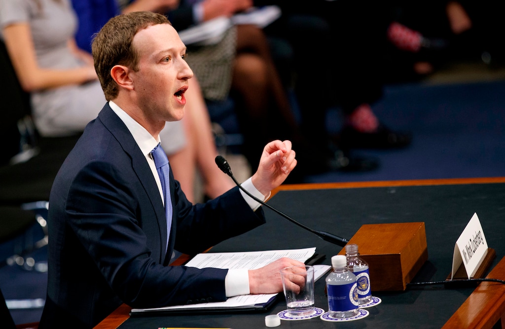 FILE- In this Tuesday, April 10, 2018, file photo, Facebook CEO Mark Zuckerberg testifies before a joint hearing of the Commerce and Judiciary Committees on Capitol Hill in Washington. Zuckerberg repeatedly assured lawmakers Tuesday and Wednesday that he didn’t believe the company violated its 2011 agreement with the Federal Trade Commission to overhaul its privacy practices. (AP Photo/Carolyn Kaster, File)