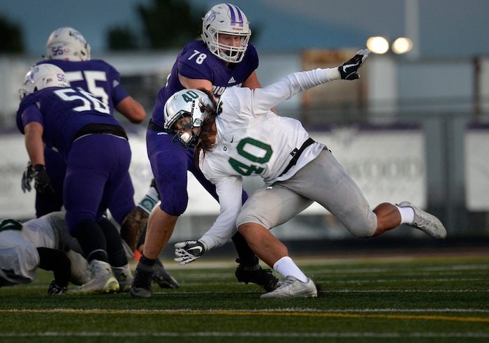 (Scott Sommerdorf   |  The Salt Lake Tribune)   Olympus DE Cameron Latu during first half play. Lehi led Olympus 26-0 late in the second half, Friday, September 22, 2017.