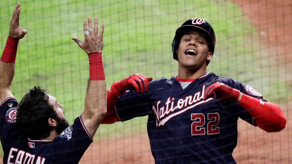 Washington Nationals' Juan Soto, right, celebrates after his home run with Adam Eaton during the fifth inning of Game 6 of the baseball World Series against the Houston Astros Tuesday, Oct. 29, 2019, in Houston. (AP Photo/Sue Ogrocki)