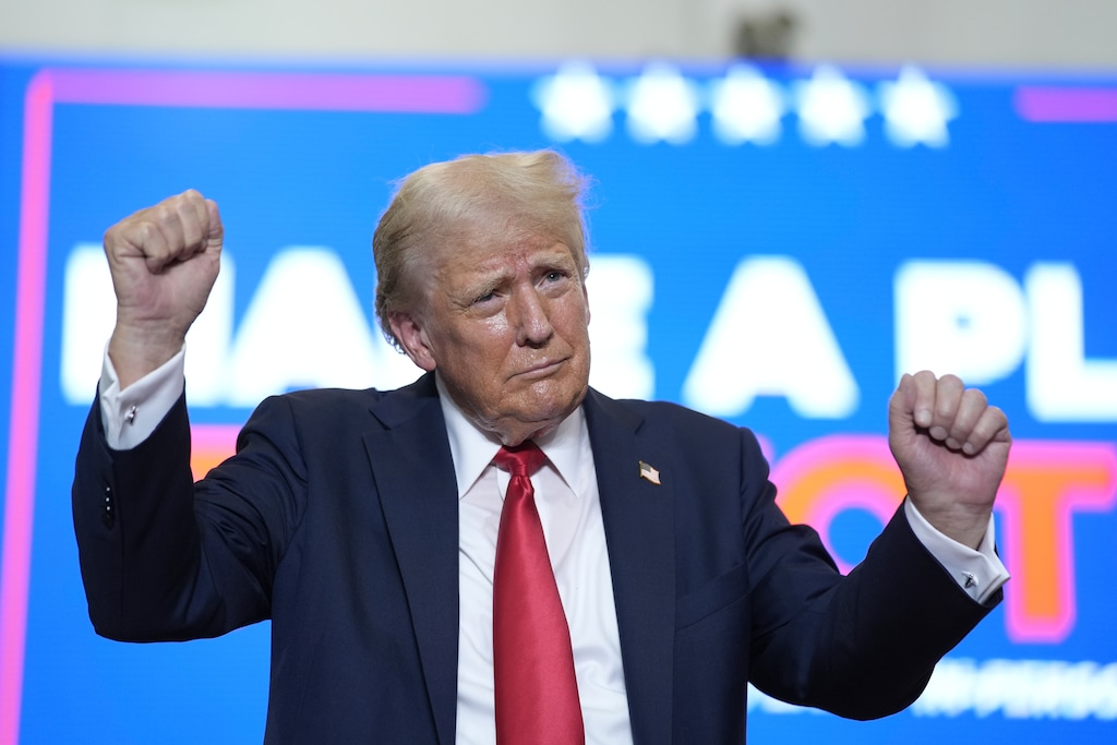 (Alex Brandon | AP) Republican presidential candidate former President Donald Trump dances as he wraps up a campaign rally, Saturday, July 27, 2024, in St. Cloud, Minn.