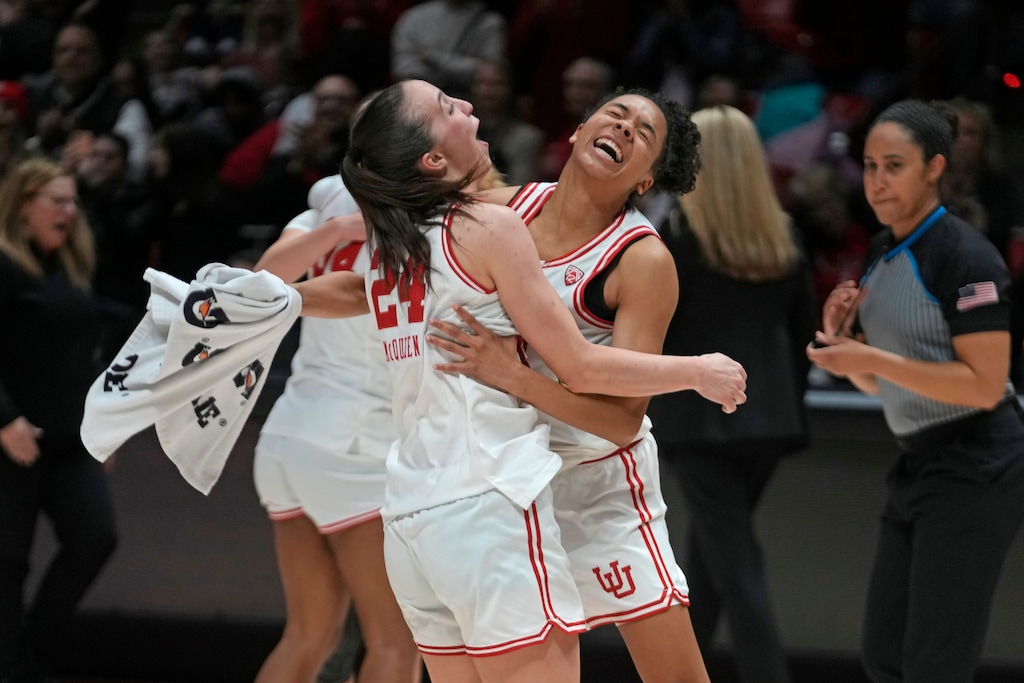 Utah's Kennady McQueen (24) and Lani White, right, celebrate their victory over UCLA during an NCAA college basketball game Monday, Jan. 22, 2024, in Salt Lake City. (AP Photo/Rick Bowmer)