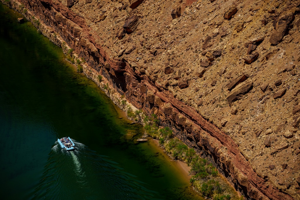 (Trent Nelson  |  The Salt Lake Tribune) A raft on the Colorado River as seen from Navajo Bridge in Ariz. on Tuesday, May 20, 2025.