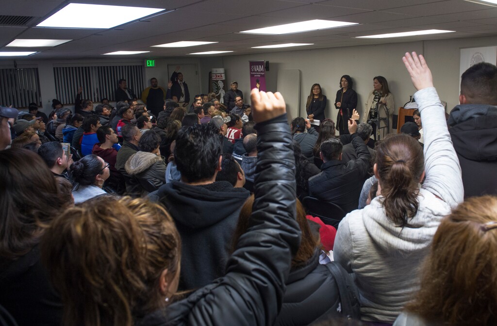 Rick Egan | The Salt Lake Tribune
A standing room only crowd raise their hands to ask questions, as Mexican Consulate representatives and immigration lawyers, spoke during a "Know Your Rights" information session in the basement of the Mexican Consulate. The crowd was so large, it had do be split into two groups, Wednesday, February 22, 2017.