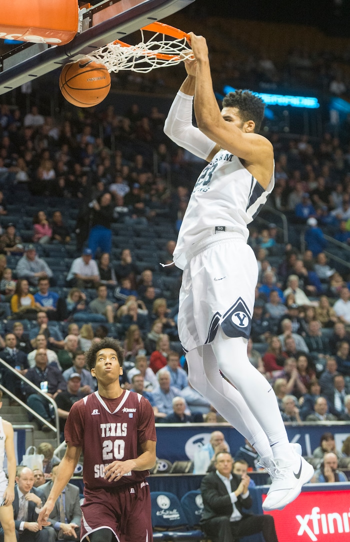 (Rick Egan  |  The Salt Lake Tribune)   Brigham Young Cougars forward Yoeli Childs (23) dunks the ball, in basketball action, Brigham Young Cougars vs Texas Southern Tigers, at the Marriott Center in Provo, Saturday, December 23, 2017.