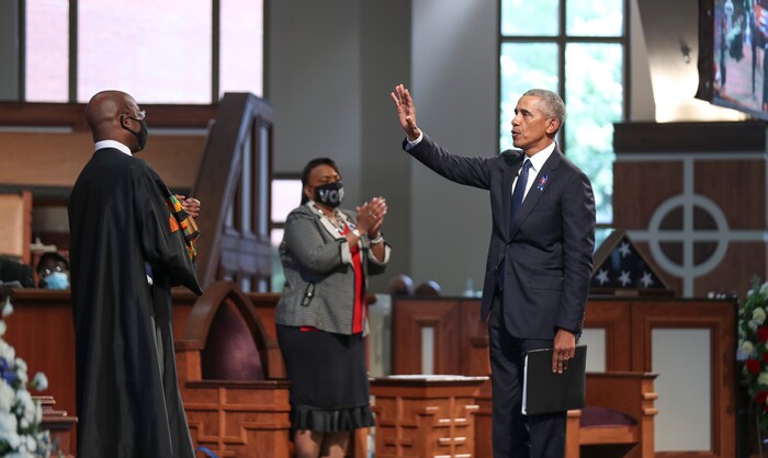 Former President Barack Obama acknowledges the crowd after addressing services for the late Rep. John Lewis, D-Ga., at Ebenezer Baptist Church in Atlanta, Thursday, July 30, 2020.  (Alyssa Pointer/Atlanta Journal-Constitution via AP, Pool)