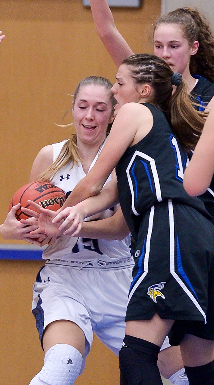 (Leah Hogsten  |  The Salt Lake Tribune)    Copper Hills High School girls' basketball team defeated Pleasant Grove High School 66-25 during their Class 6A girls' basketball playoff opener at Salt Lake Community College Tuesday, Feb. 20, 2018. 