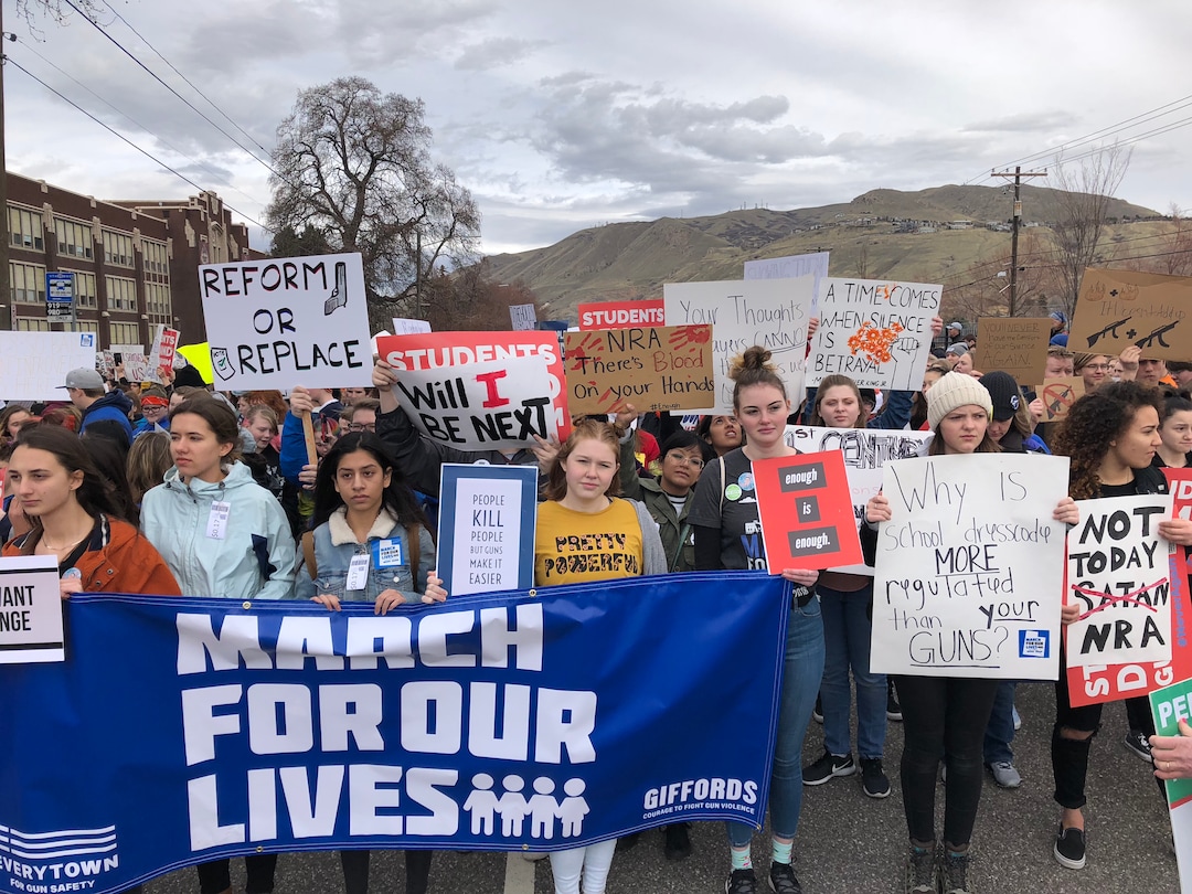 (Chris Detrick | The Salt Lake Tribune)  Participants hold signs during the March For Our Lives rally in Salt Lake City Saturday, March 24, 2018.