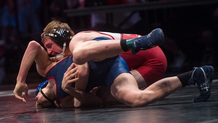 (Rick Egan  |  The Salt Lake Tribune)   Quenton Mortimer (American Leadership Academy) wrestles Triston Fillmore (South Sevier) in the 3A State Wrestling Championship at UVU in Orem, Saturday, February 10, 2018.