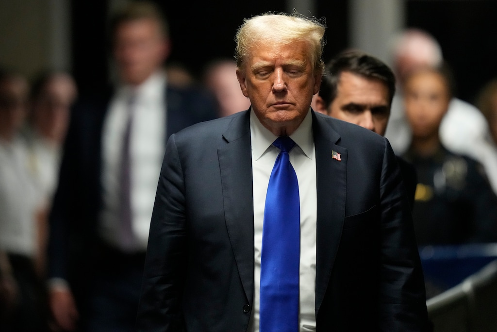 (Seth Wenig | AP) Former President Donald Trump walks to make comments to members of the media after being found guilty on 34 felony counts of falsifying business records in the first degree at Manhattan Criminal Court, Thursday, May 30, 2024, in New York. Donald Trump became the first former president to be convicted of felony crimes as a New York jury found him guilty of 34 felony counts of falsifying business records in a scheme to illegally influence the 2016 election through hush money payments to a porn actor who said the two had sex.