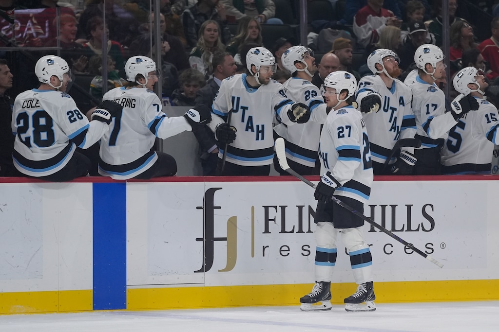 Utah Hockey Club center Barrett Hayton (27) celebrates after scoring during the first period of an NHL hockey game against the Minnesota Wild, Thursday, Jan. 23, 2025, in St. Paul, Minn. (AP Photo/Abbie Parr)