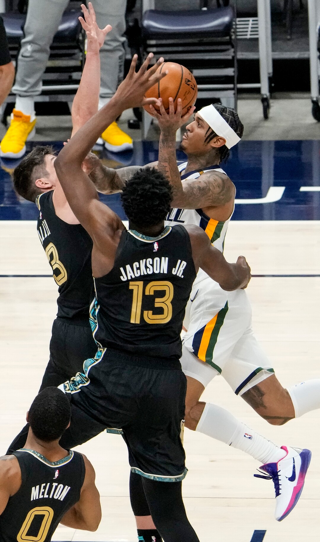 (Leah Hogsten | The Salt Lake Tribune) Utah Jazz guard Jordan Clarkson (00) is pressured by Memphis Grizzlies guard Grayson Allen (3) and Memphis Grizzlies forward Jaren Jackson Jr. (13) as the Utah Jazz take on the Memphis Grizzlies during Game 1 of the first-round playoffs at Vivint Arena, May 23, 2021.