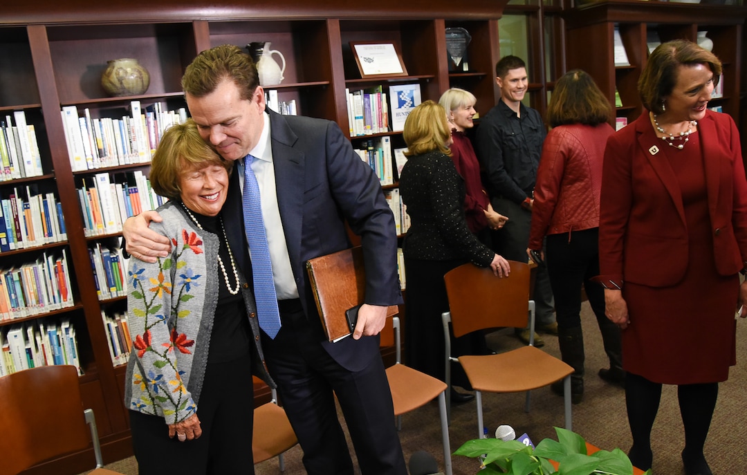 (Francisco Kjolseth  |  The Salt Lake Tribune)  Karen Huntsman, chairwoman of the Huntsman Foundation, is embraced by her son, Peter Huntsman, chairman and CEO of the Huntsman Cancer Foundation, as they continue the legacy of the late Jon M. Huntsman Sr. with an announced $30 million gift to the Huntsman Cancer Institute on Friday, Jan. 11, 2019.