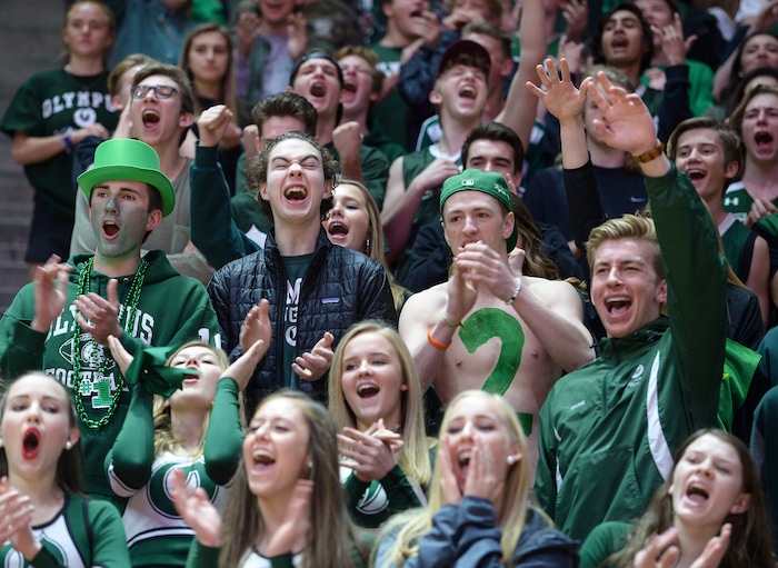 (Leah Hogsten | The Salt Lake Tribune) Olympus fans cheer on the team. Olympus plays Corner Canyon for the 5A High School BoysÕ Basketball Tournament Championship at the Jon M. Huntsman Center in Salt Lake City, Saturday, March 3, 2018.