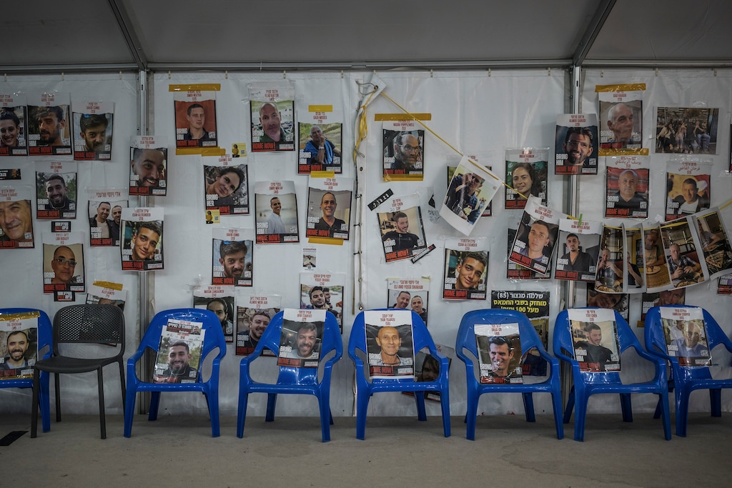 Posters of some of the people taken hostage during the Hamas-led attacks on Oct. 7, in a square outside the Tel Aviv Museum of Art in Tel Aviv, Israel, Feb. 17, 2024. (Sergey Ponomarev/The New York Times)