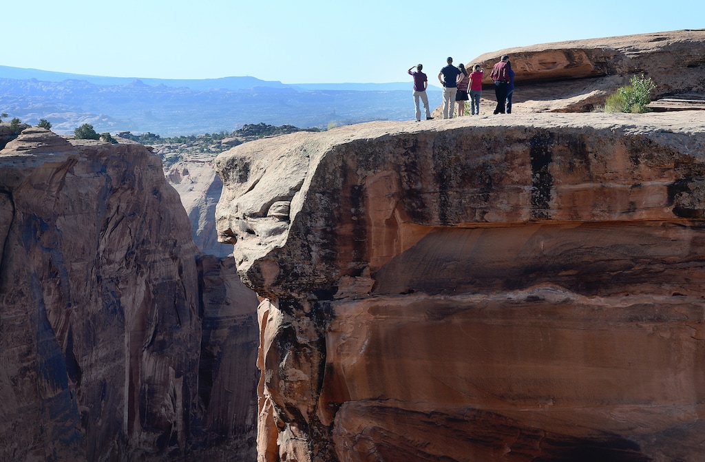 (Scott Sommerdorf  | The Salt Lake Tribune) Interior Secretary Sally Jewell tours the Gemini Bridges area in 2016. As part of a new land-use plan, the Bureau of Land Management has closed some off-road trails Labyrinth Rims/Gemini Bridges in Utah.