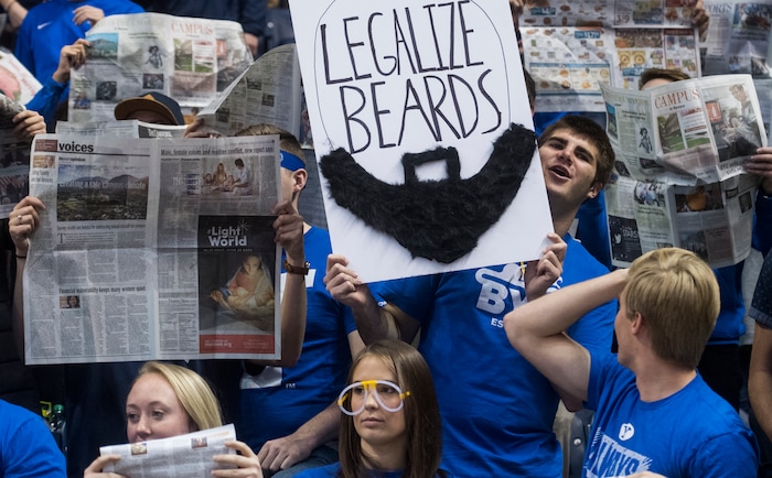 (Rick Egan  |  The Salt Lake Tribune) Brigham Young Cougars fans make a statement during in basketball action Utah Utes vs. Brigham Young Cougars at the Marriott Center in Provo, Saturday, December 15, 2017.


