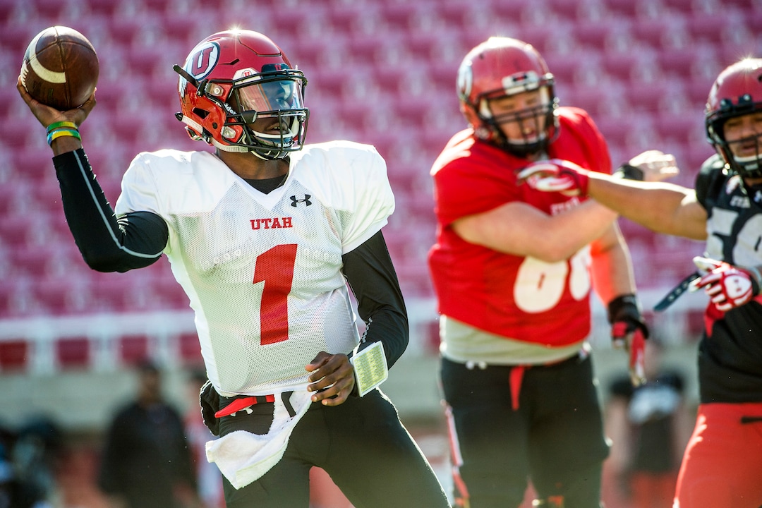 Chris Detrick  |  The Salt Lake TribuneUtah Utes quarterback Tyler Huntley (1) passes the ball during a practice at Rice-Eccles Stadium  Tuesday April 5, 2016. 