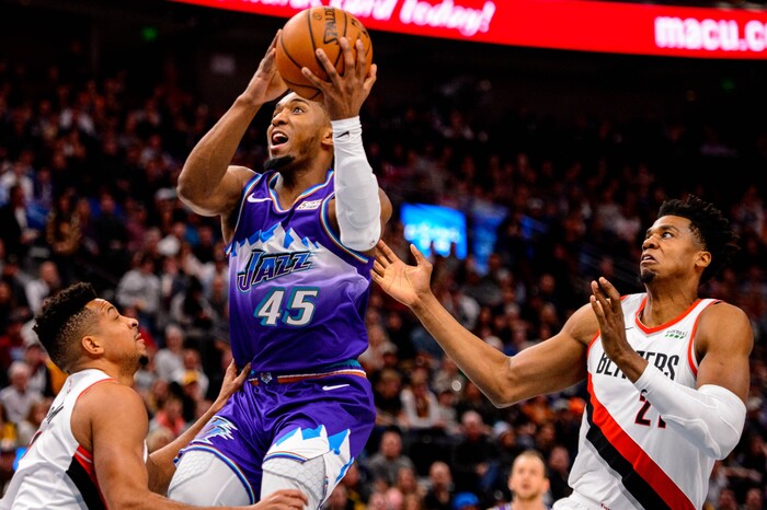 (Trent Nelson  |  The Salt Lake Tribune) Utah Jazz guard Donovan Mitchell (45) shoots as the Utah Jazz host the Portland Trail Blazers, NBA basketball in Salt Lake City on Thursday, Dec. 26, 2019.