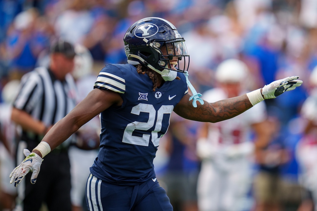 (Trent Nelson | The Salt Lake Tribune) Brigham Young Cougars running back Deion Smith (20) celebrates a touchdown as BYU hosts Southern Utah University, NCAA football in Provo on Saturday, Sept. 9, 2023.