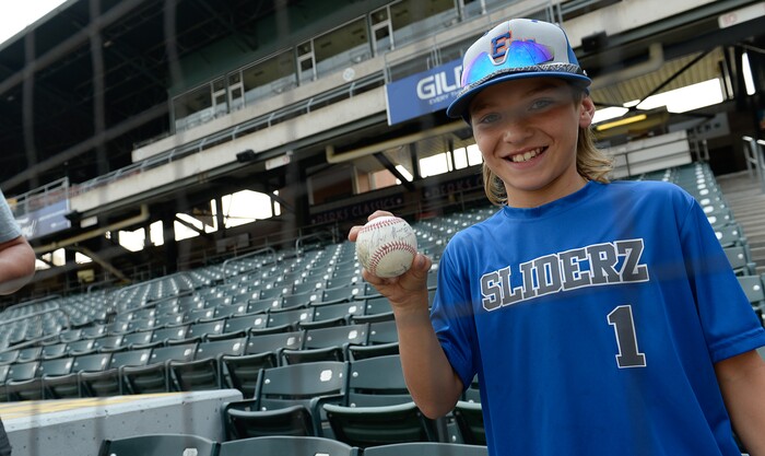 (Francisco Kjolseth  |  The Salt Lake Tribune)  Young fan of the Utah-filmed "The Sandlot," Rydge Butler, 11, is all smiles as he gets a signed baseball by members of the cast. "I've watched the movie like a hundred times," exclaimed Butler as the the Salt Lake Bees celebrate the 25th anniversary of the film with members of the original cast at the Smith's Ballpark on Friday, Aug. 10, 2018.